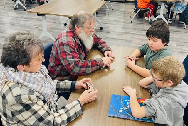 young and older adults enjoying time together